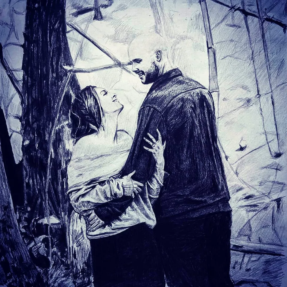a couple dancing together beneath hanging lanterns