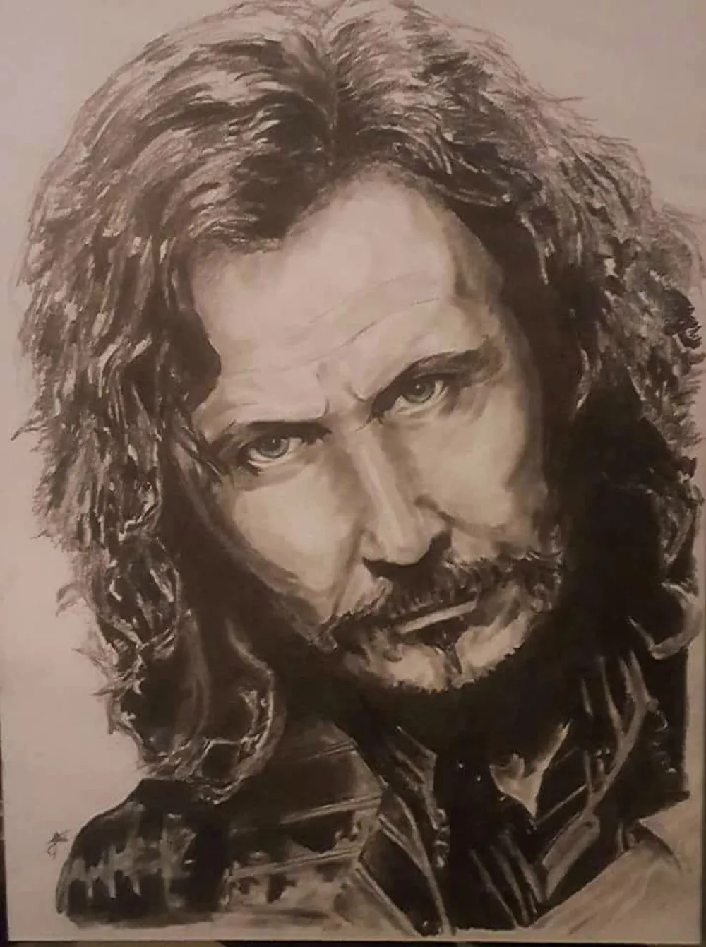 a graphite portrait of a gaunt man with long, wavy dark hair, a moustache and short beard, looking straight out of the frame above a dark collar