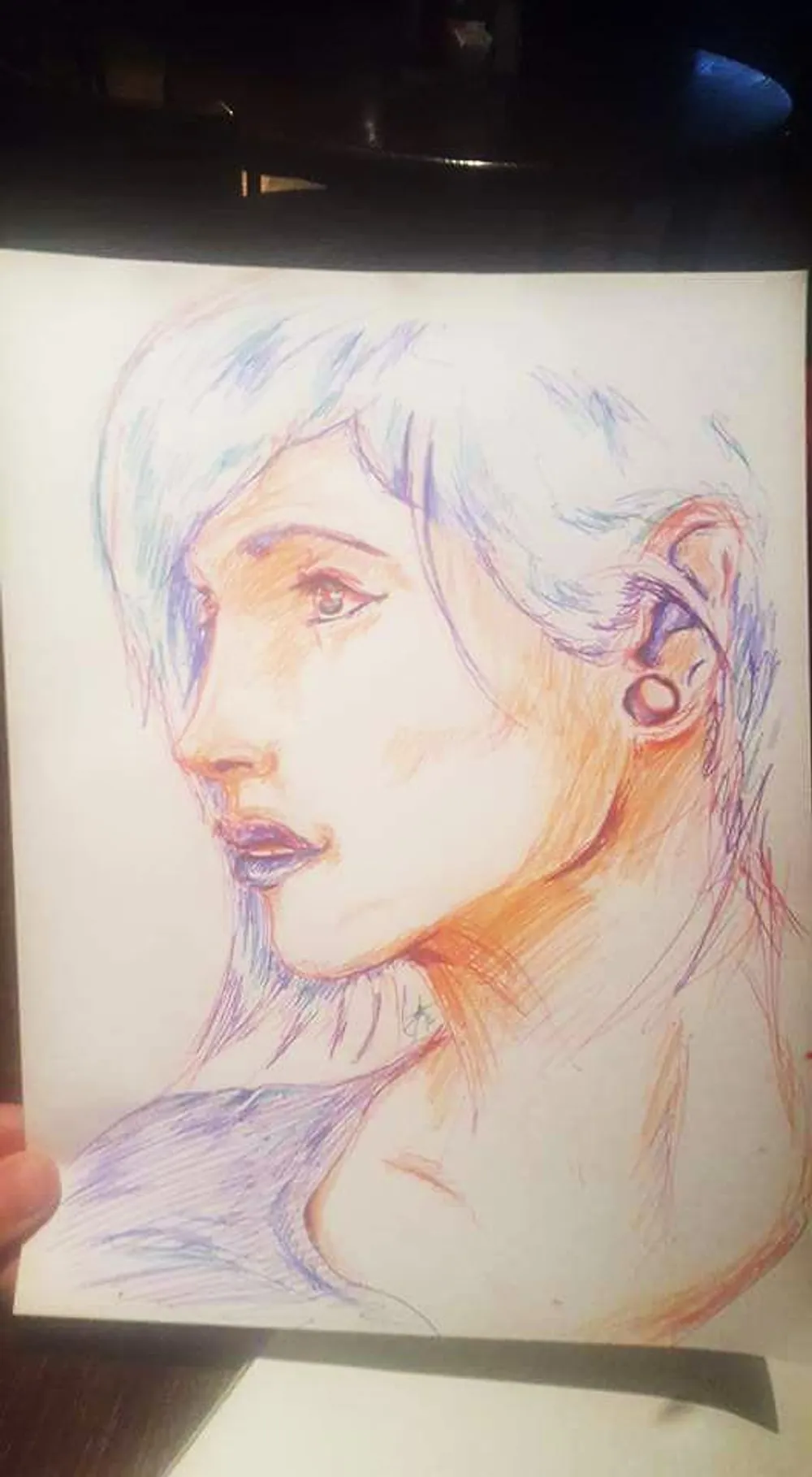 a young woman in profile