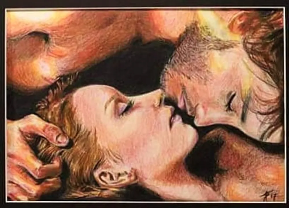 a couple with foreheads touching, eyes closed